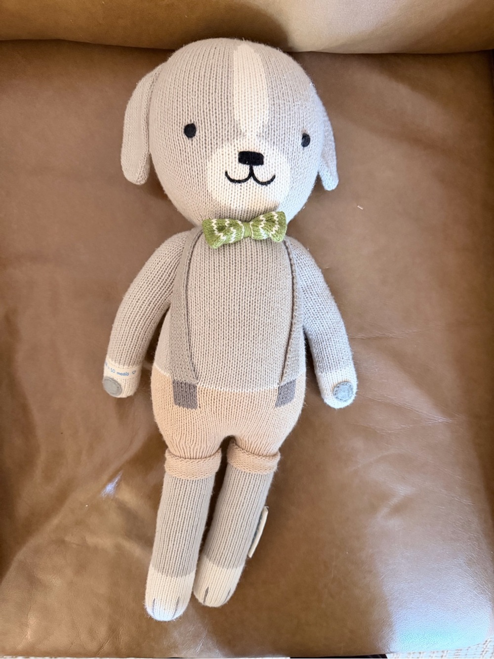 Plush Knit Cuddle + Kind Dog Toy in Beige with Green Bow